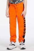 Дитячі бавовняні штани Guess колір помаранчевий з аплікацією (2856688)