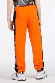 Дитячі бавовняні штани Guess колір помаранчевий з аплікацією (2856688)