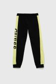 Дитячі бавовняні штани Guess колір чорний з аплікацією (2856727)