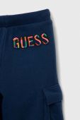 Дитячі бавовняні штани Guess колір синій однотонні (3053002)