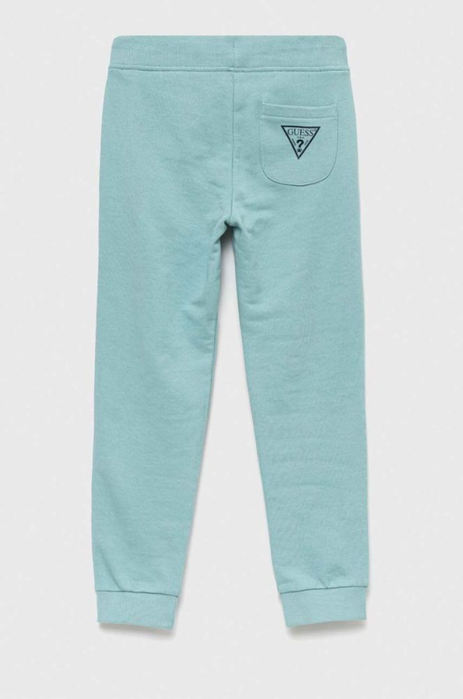Дитячі бавовняні штани Guess колір бірюзовий однотонні (3136316) фото 2