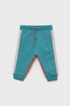 Дитячі бавовняні штани Coccodrillo колір бірюзовий візерунок Дитячі бавовняні штани Coccodrillo колір бірюзовий візерунок