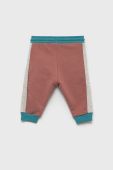 Дитячі бавовняні штани Coccodrillo колір бірюзовий візерунок