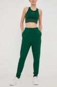 Спортивні штани Tommy Hilfiger жіночі колір зелений однотонні