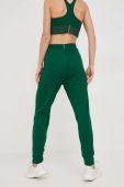 Спортивні штани Tommy Hilfiger жіночі колір зелений однотонні