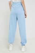 Бавовняні спортивні штани Tommy Jeans жіночі з аплікацією колір блакитний