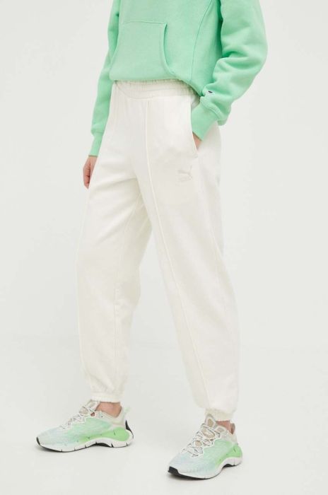 Бавовняні спортивні штани Puma колір бежевий однотонні 535685-01