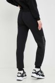 Спортивні штани Reebok Жіночі колір чорний з принтом