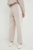 Штани для тренувань adidas Performance жіночі колір бежевий з аплікацією