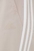 Штани для тренувань adidas Performance жіночі колір бежевий з аплікацією