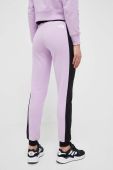 Бавовняні спортивні штани The North Face колір фіолетовий однотонні (3224871)