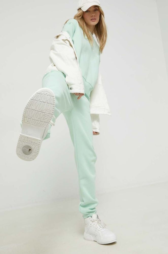 Спортивні штани Juicy Couture жіночі колір зелений з аплікацією (2891083) фото 2
