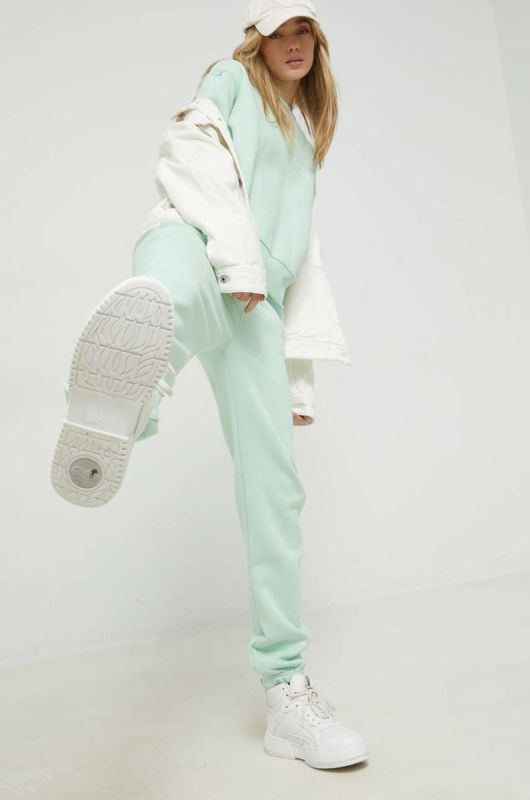 Спортивні штани Juicy Couture жіночі колір зелений з аплікацією (2891083) фото 2