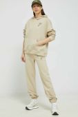 Бавовняні спортивні штани Fila колір бежевий однотонні (3036318)