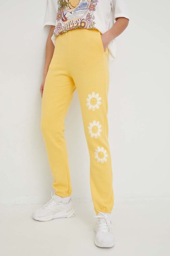 Бавовняні спортивні штани Billabong X SMILEY жіночі колір жовтий з принтом