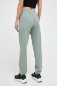 Бавовняні спортивні штани adidas колір зелений однотонні