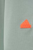 Бавовняні спортивні штани adidas колір зелений однотонні