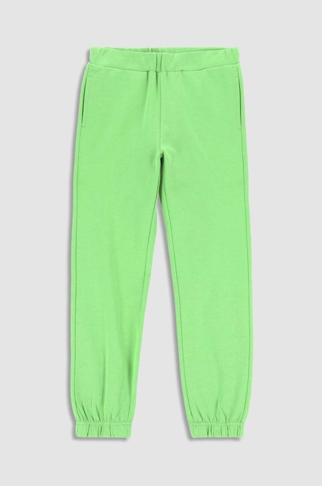 Дитячі бавовняні штани Coccodrillo колір зелений однотонні (2990782)