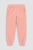 Дитячі бавовняні штани Coccodrillo колір рожевий однотонні (2990895)