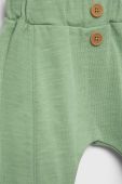 Бавовняні штани для немовлят United Colors of Benetton колір зелений однотонні