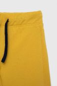Дитячі бавовняні штани United Colors of Benetton колір жовтий з принтом (3064912)