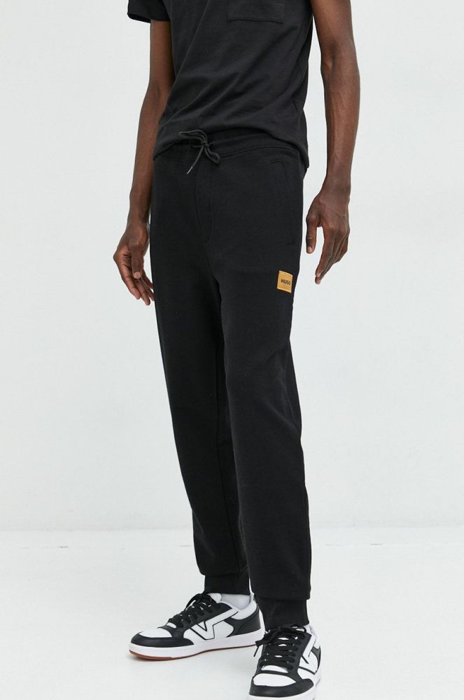 Бавовняні спортивні штани HUGO чоловічі колір чорний