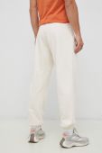 Бавовняні спортивні штани Reebok Classic колір бежевий однотонні HS9153-NONDYE
