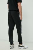 Бавовняні спортивні штани adidas Чоловічі колір чорний з аплікацією