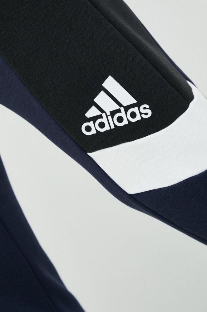 Спортивні штани adidas чоловічі колір синій візерунок фото 4