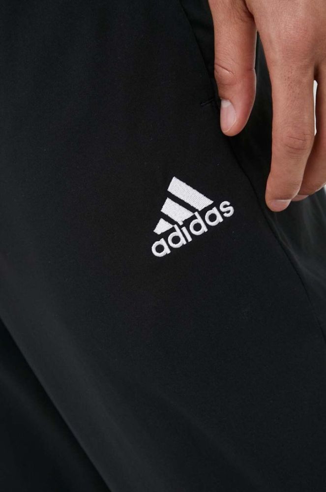 Штани для тренувань adidas Essentials Stanford колір чорний з аплікацією фото 4