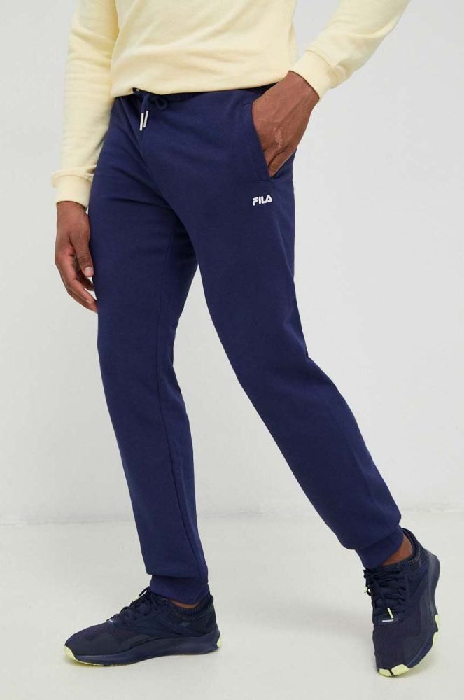 Спортивні штани Fila колір синій однотонні
