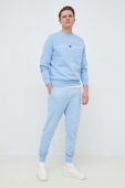 Бавовняні спортивні штани Tommy Hilfiger з принтом колір блакитний