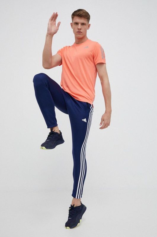 Штани для тренувань adidas Performance Train Essentials 3-Stripes колір синій з аплікацією фото 2