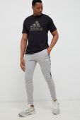 Бавовняні спортивні штани adidas колір сірий з принтом