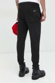 Бавовняні спортивні штани Tommy Jeans колір чорний з принтом (3015013)