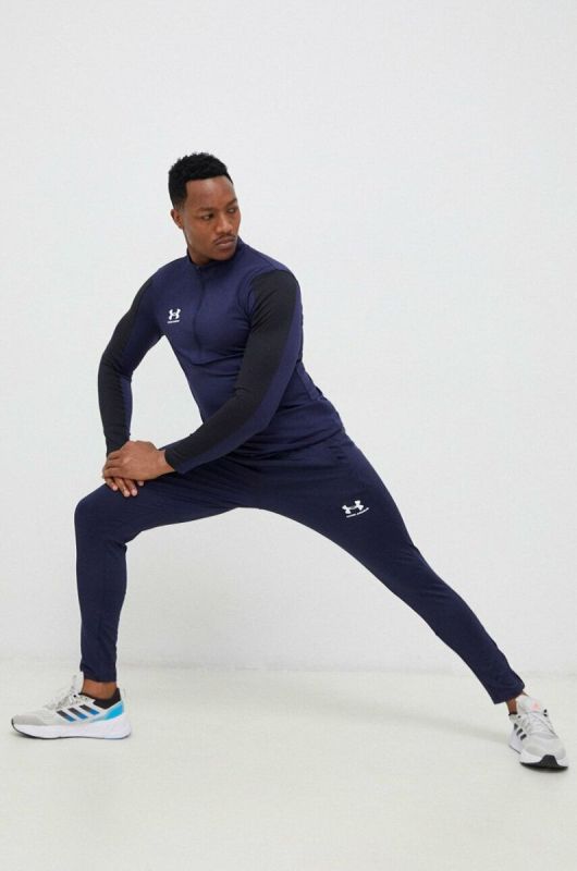 Штани для тренувань Under Armour Challenger колір фіолетовий однотонні фото 2