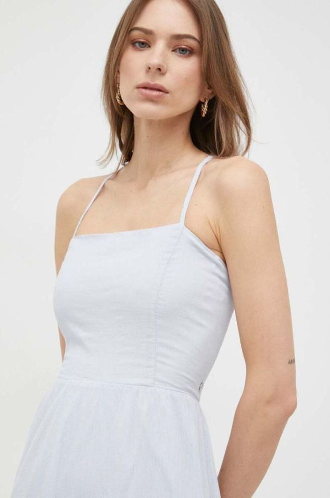 Бавовняна сукня Guess midi розкльошена колір блакитний фото 4