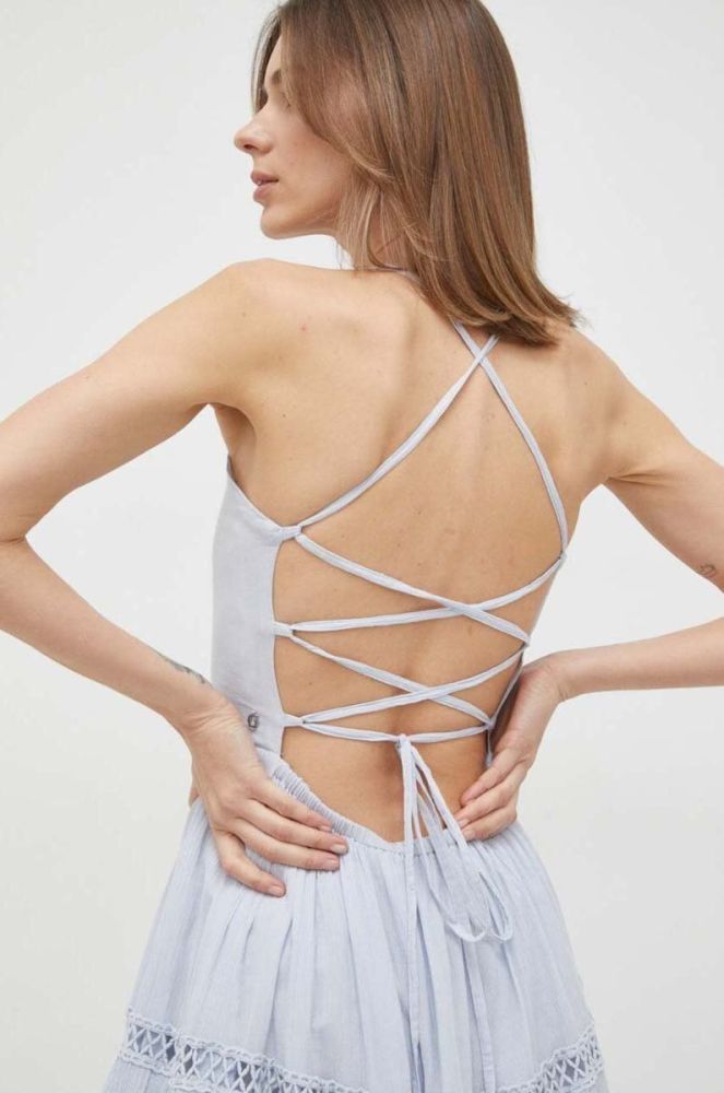 Бавовняна сукня Guess midi розкльошена колір блакитний фото 5