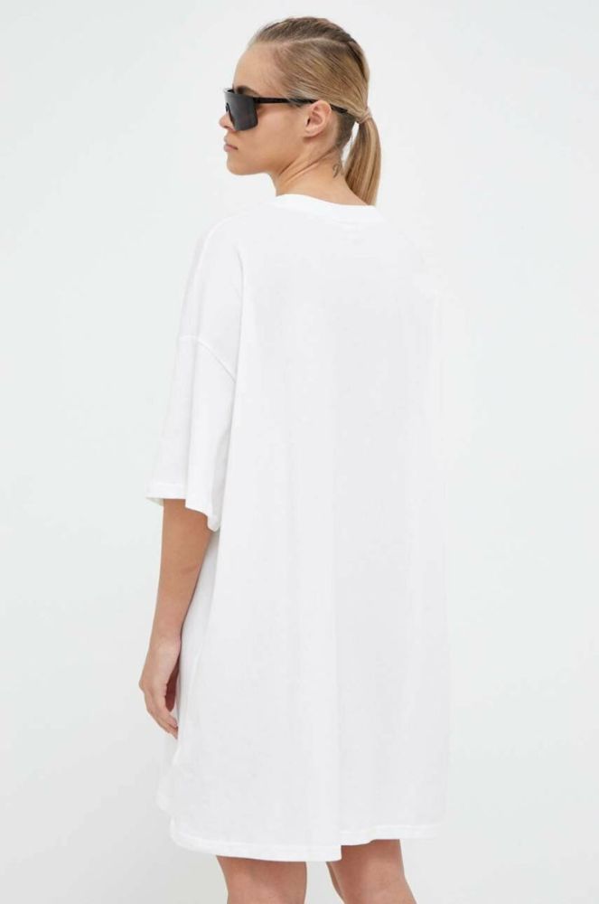 Бавовняна сукня Puma колір білий mini oversize фото 3