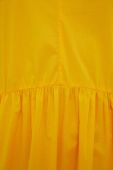 Бавовняна сукня United Colors of Benetton колір жовтий midi розкльошена
