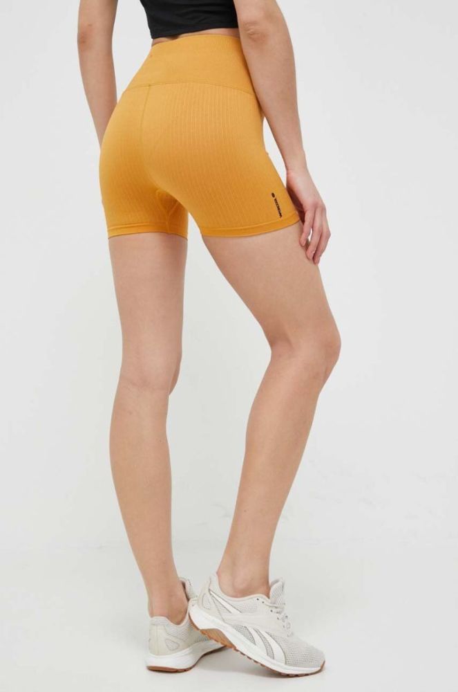 Шорти для тренувань Rip Curl колір жовтий однотонні висока посадка фото 3