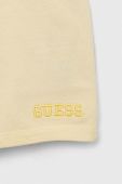 Дитячі бавовняні шорти Guess колір жовтий однотонні