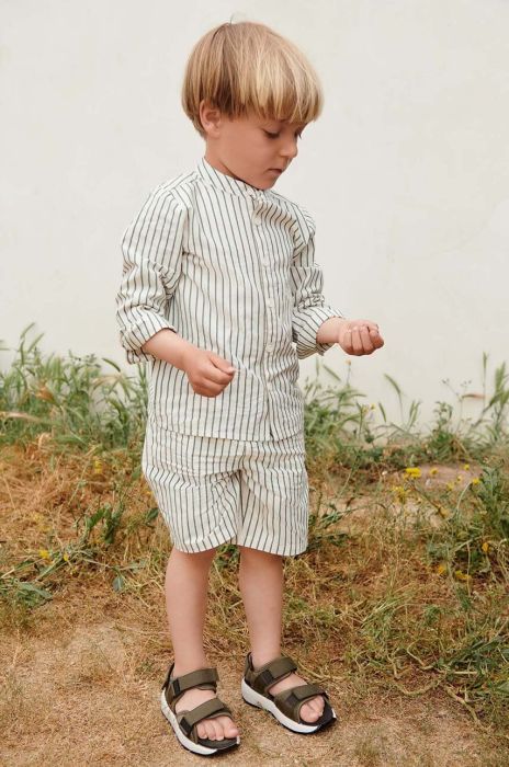 Дитячі бавовняні шорти Liewood Monori колір зелений візерунок регульована талія