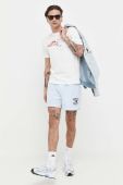 Бавовняні шорти Tommy Jeans колір блакитний (3219378)