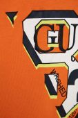 Дитяча бавовняна футболка Guess колір помаранчевий з принтом (2871356)