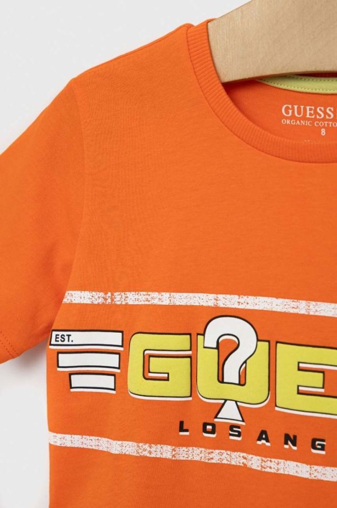 Дитяча бавовняна футболка Guess колір помаранчевий з принтом (3015493) фото 3