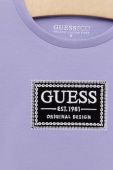Дитяча футболка Guess колір фіолетовий з аплікацією