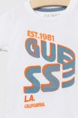 Дитяча бавовняна футболка Guess колір білий з принтом (2871417)