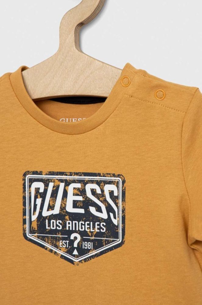 Дитяча бавовняна футболка Guess колір жовтий з принтом (3133418) фото 3