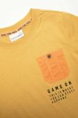 Дитяча бавовняна футболка Coccodrillo колір жовтий з принтом (2997380)